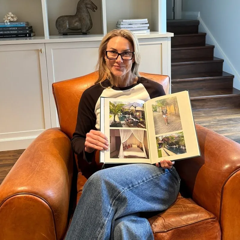 Dani Smith with their Photouria family holiday book